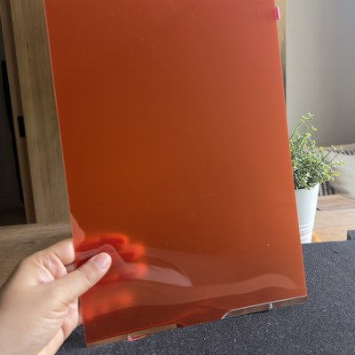 ตัวอย่างจริงสี Smart Glass · ฝังฟิล์ม PDLC สี เบิร์นท์ออเรนจ์ Burnt Orange ใน Tempered Laminated