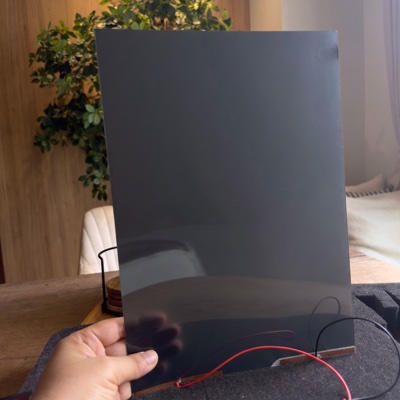 ตัวอย่างจริงสี Smart Glass · ฝังฟิล์ม PDLC สี ชาร์โคล Charcoal ใน Tempered Laminated
