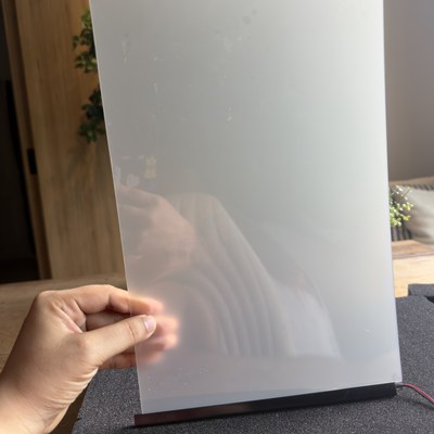 ตัวอย่างจริงสี Smart Glass · ฝังฟิล์ม PDLC สี มิลกี้ไวท์ Milky White ใน Tempered Laminated