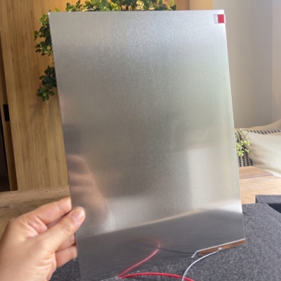 ตัวอย่างจริงสี Smart Glass · ฝังฟิล์ม PDLC สี ซิลเวอร์ Silver ใน Tempered Laminated