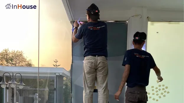 Installed by the InHouse crew · smart film · finishing the power system meticulously — Khun Rachanon Private Home Gym & Poolside Smart Glass